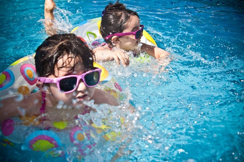 Girls In Swimming Pool Photo By Juan Salamanca From Pexels